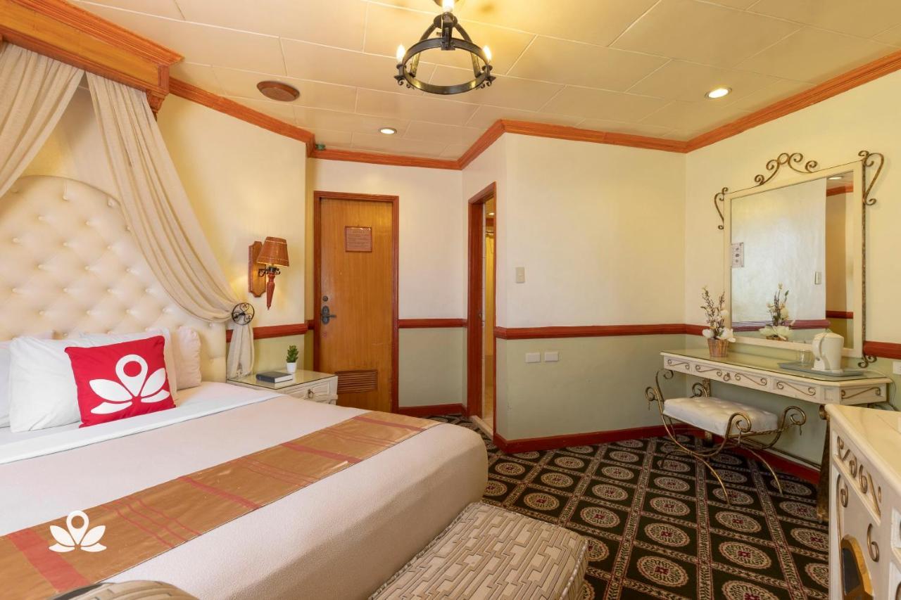 Zen Rooms Camelot Hotel Qc Cidade Quezon Exterior foto